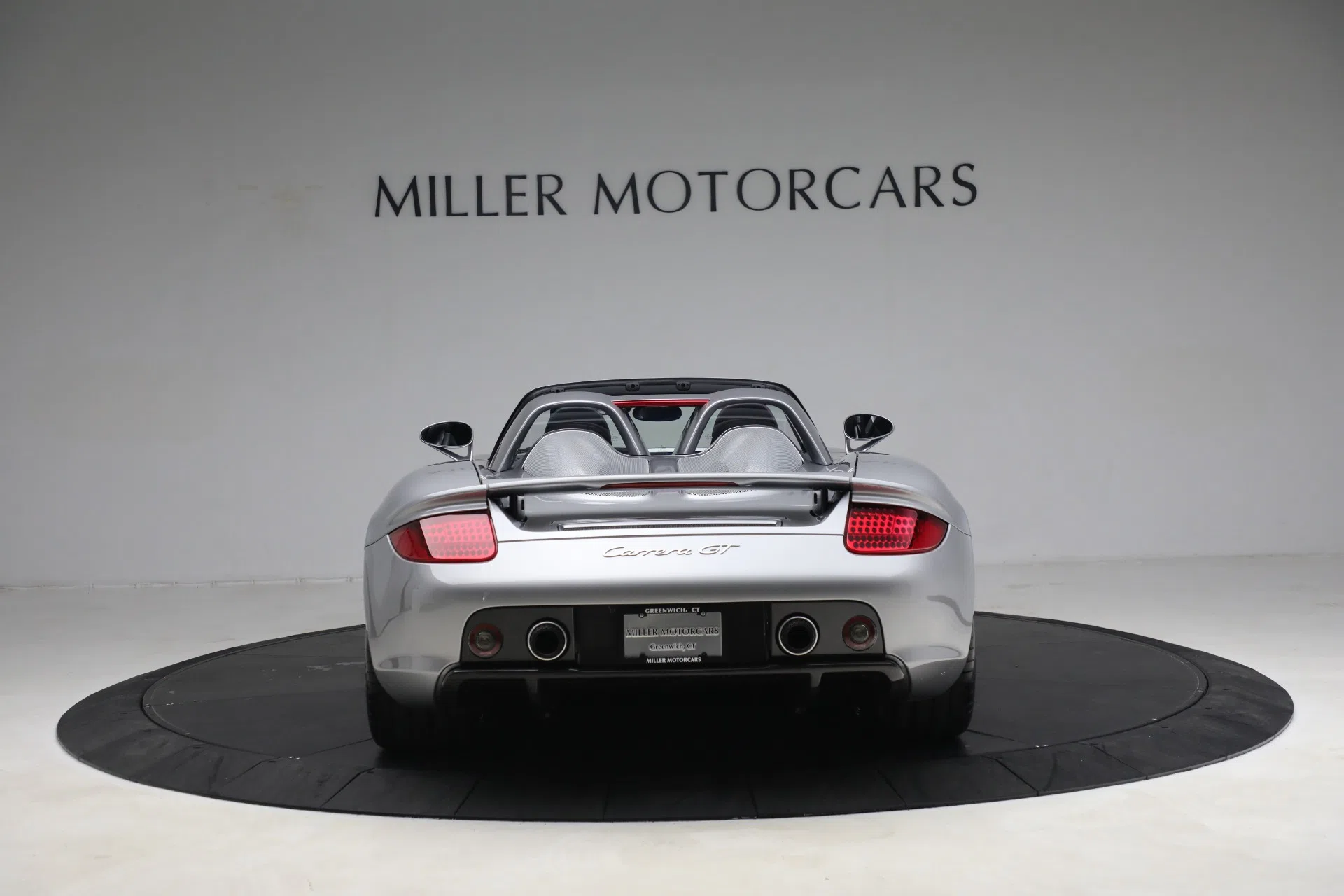 2005 Porsche Carrera GT, rear three-quarter view, GT Silver Metallic
