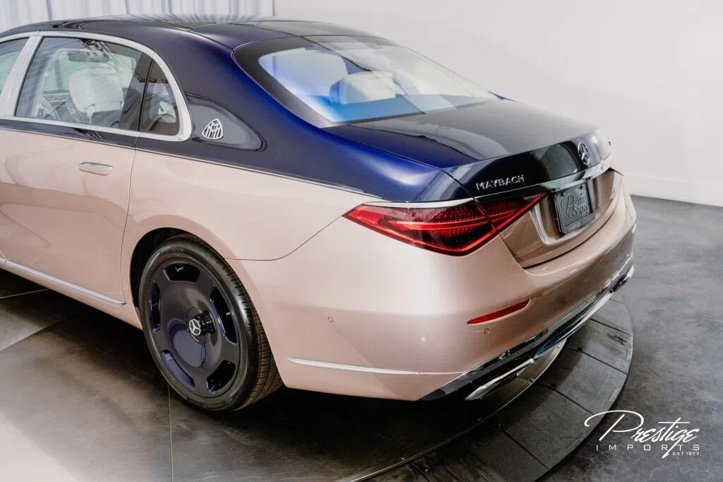 2023 Mercedes-Maybach S 680 Haute Voiture, rear three-quarter view, Nautical Blue Metallic / Rose Gold