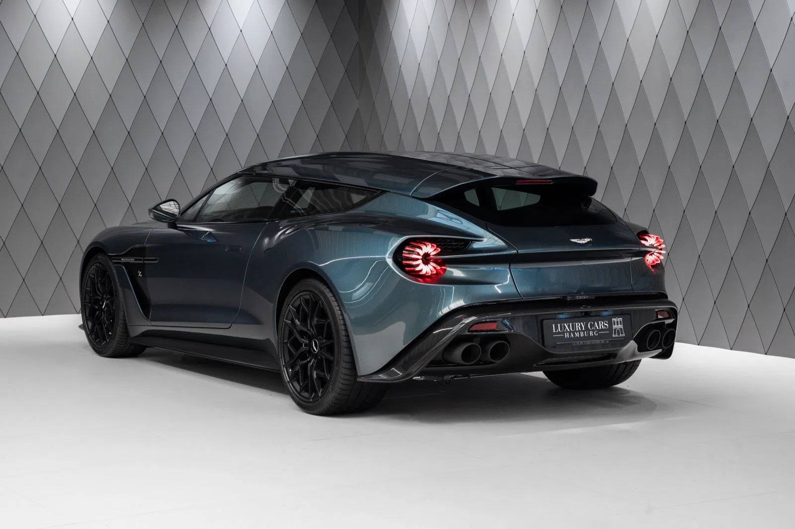 2019 Aston Martin Vanquish Zagato Shooting Brake, rear three-quarter view, Blue