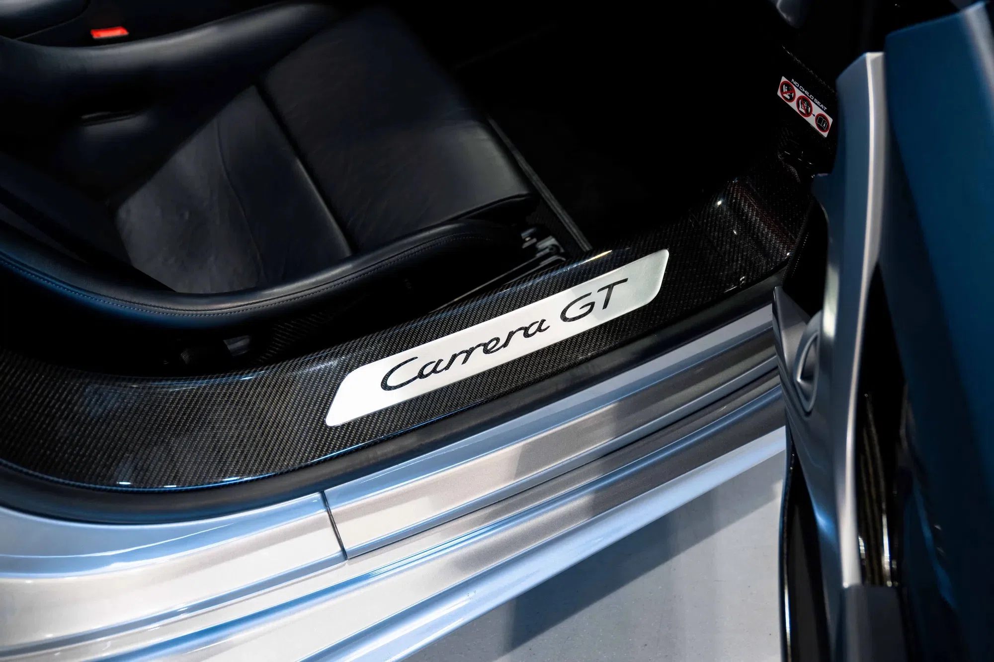 2005 Porsche Carrera GT interior, door sill, Natural Black leather
