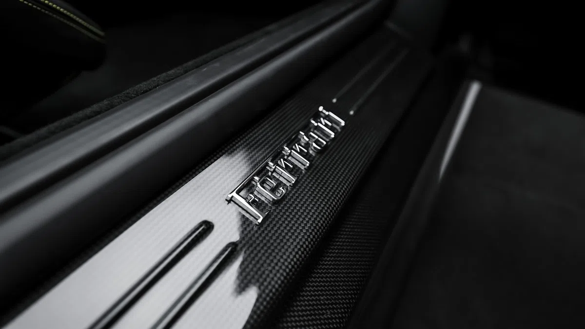 2022 Ferrari 812 GTS interior, door sill, Nero | Giallo