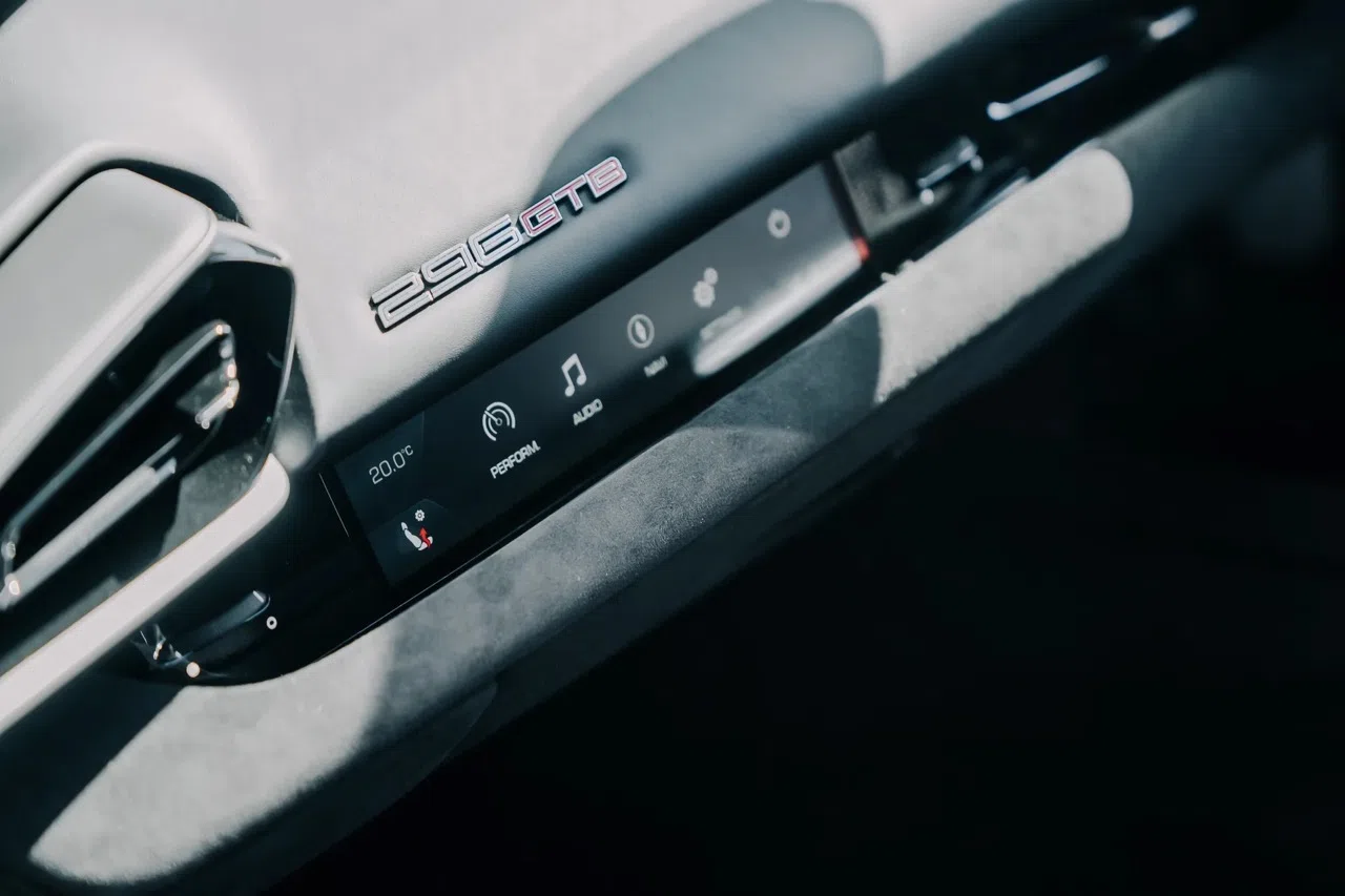 2023 Ferrari 296 GTB interior, center console, Nero Hide
