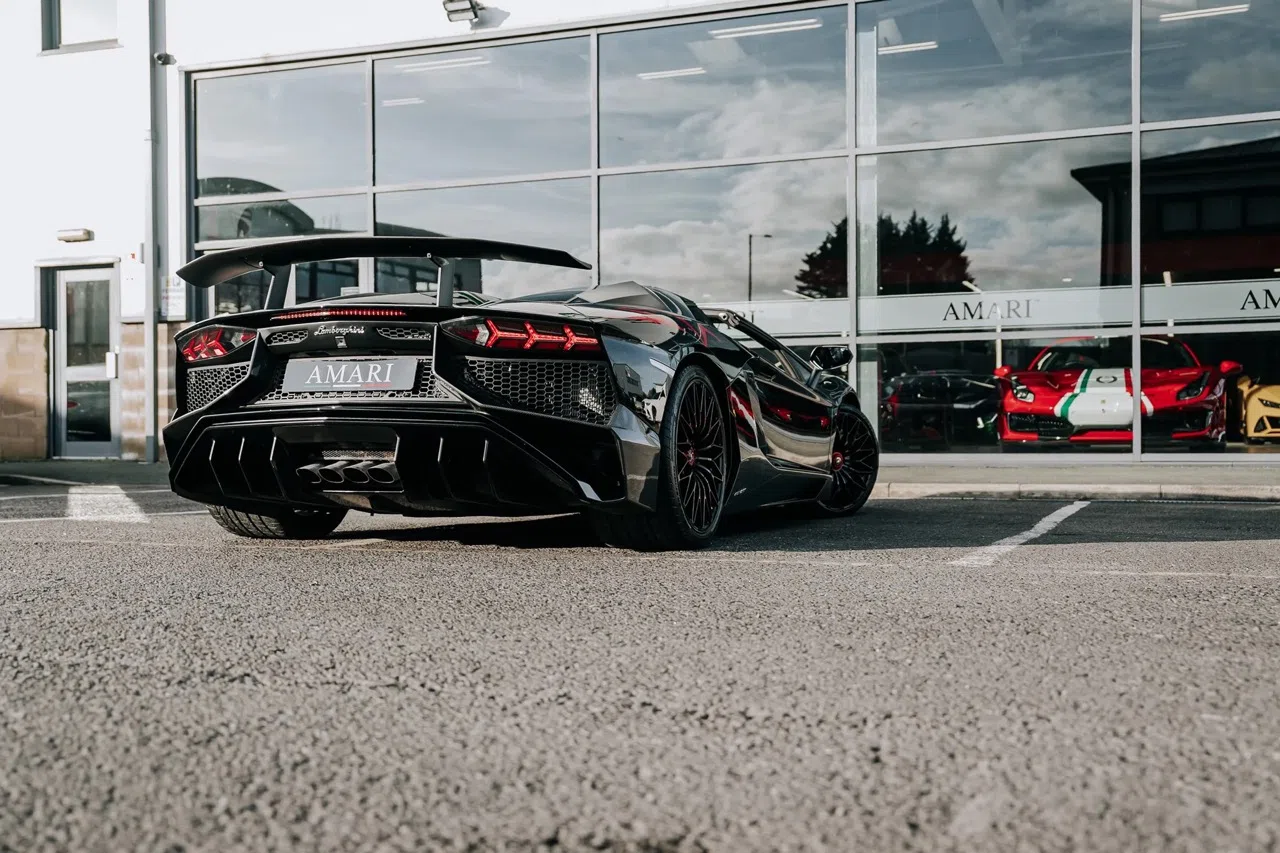 2016 Lamborghini Aventador SV Roadster for sale, exterior, Nero Cosmus w/ Rosso Alala