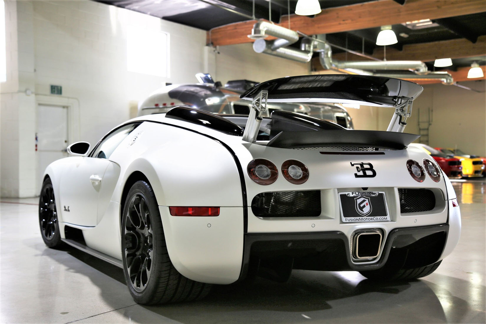 2010 Bugatti Veyron Grand Sport, 1 OF 1 BLANC NOIR - Fusion Luxury